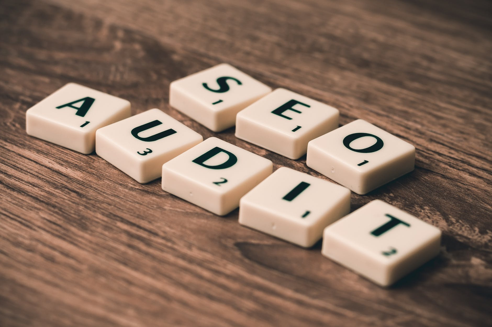 learn seo in nigeria: audit white blocks on brown wooden surface
