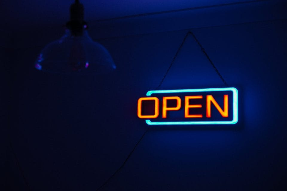 yellow and teal open neon signage